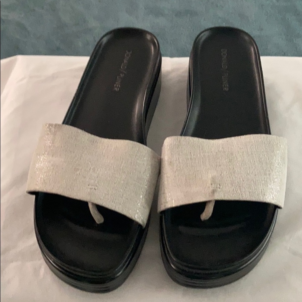 Between the toe slides